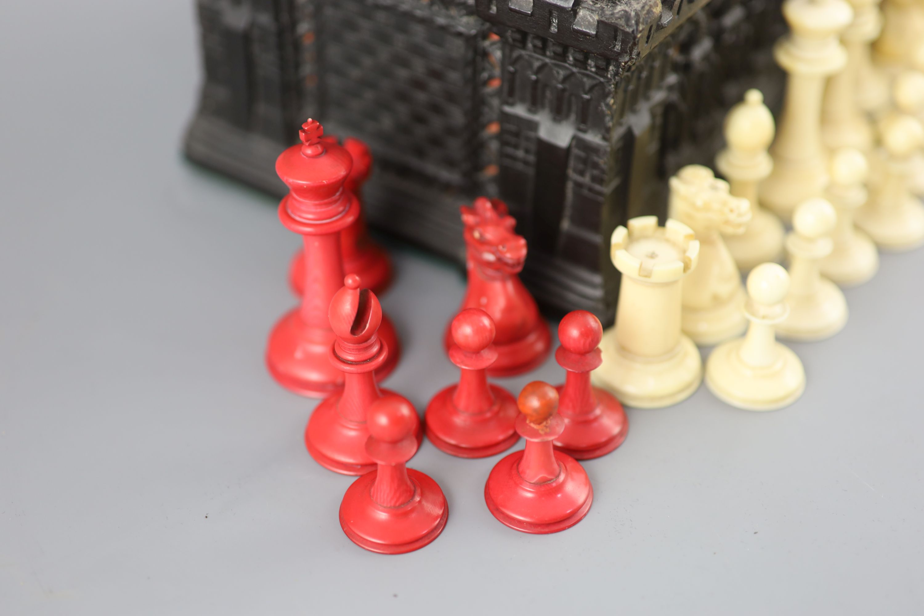 A Jaques London red and white ivory 2¾ Staunton chess set, c.1850, 8.25 x 6 x 4in.